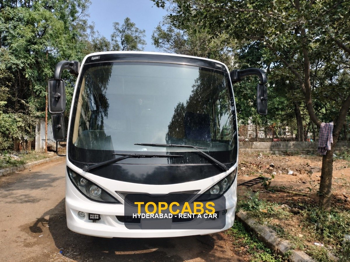 TopCabs 28-seater coach front exterior