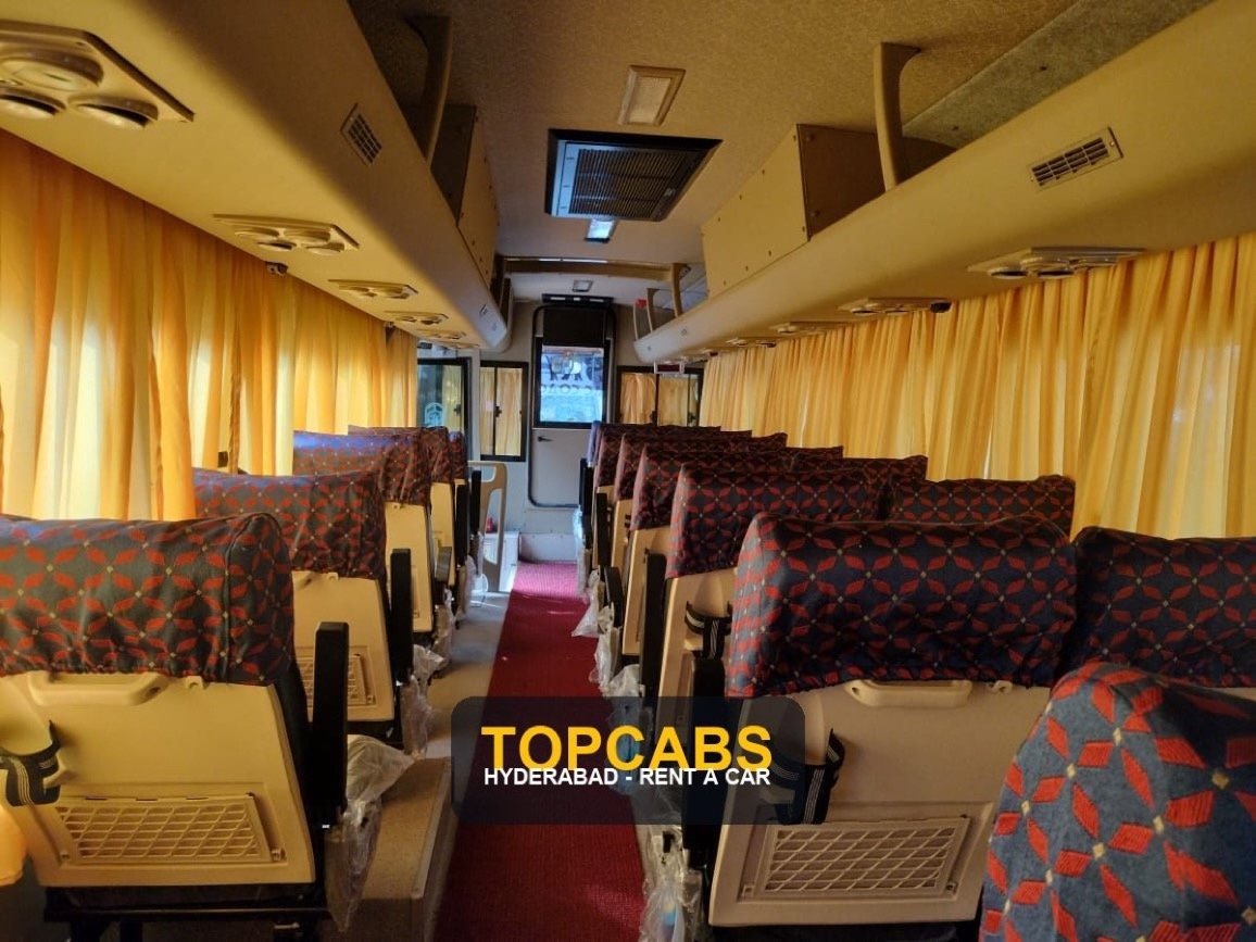 TopCabs 28-seater AC coach passenger interior