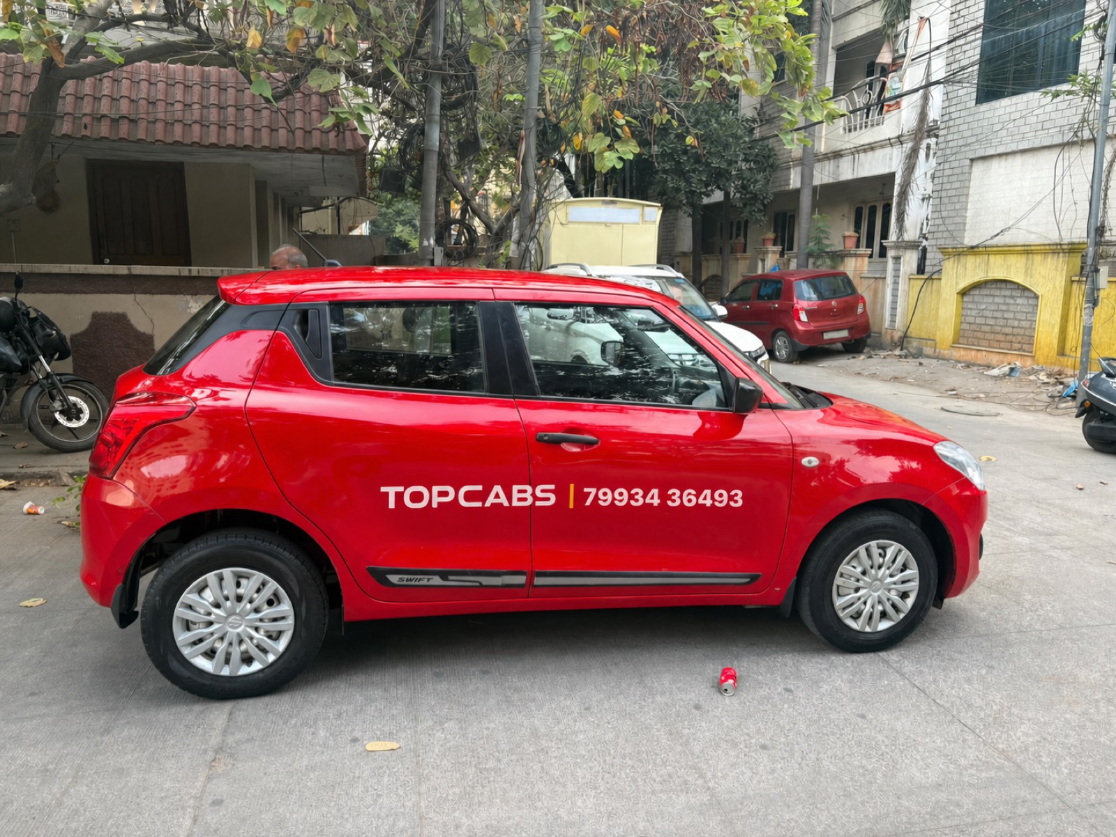 TopCabs Swift hatchback for local travel in Hyderabad