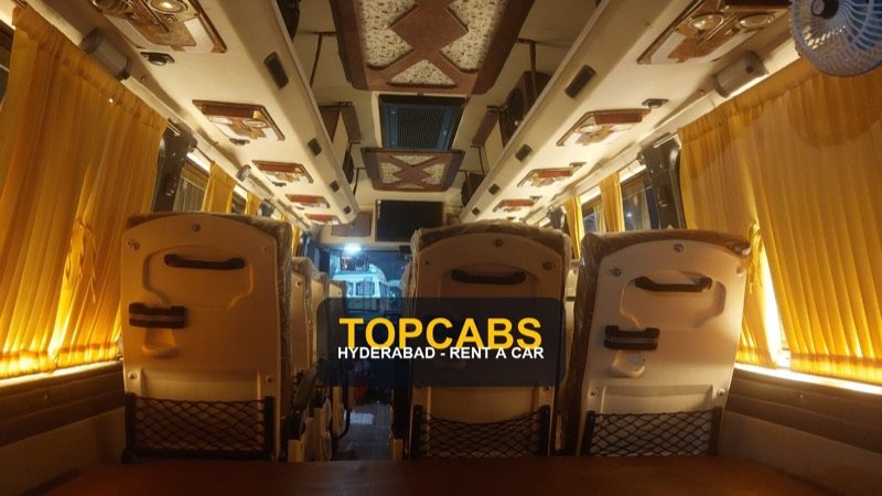 TopCabs Tempo Traveller passenger cabin interior